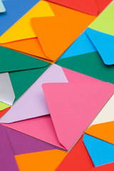 Different colored envelopes on the desk