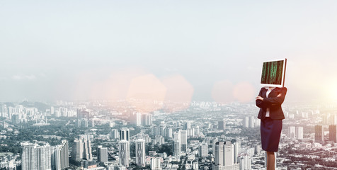 Business woman with monitor instead of head.