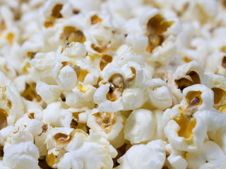 close - up pop corn grains. Cinema and television watching snacks