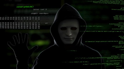 Male hacker on dark background start the hacking process, stealing information - Powered by Adobe