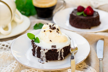 Molten chocolate cake fondant with vanilla ice cream for dessert