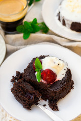 Molten chocolate cake fondant with vanilla ice cream for dessert