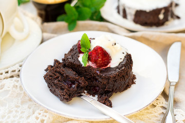 Fototapeta na wymiar Molten chocolate cake fondant with vanilla ice cream for dessert
