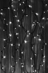 Christmas lights black and white effect background.