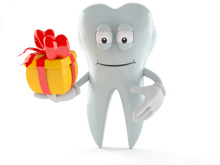 Tooth character holding gift