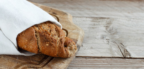 Wholemeal Bread on a Wooden Table