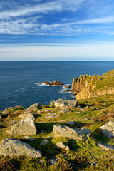 Fototapeta na wymiar Rough and rocky shore near Land's End, the most westerly point of England, Cornwall