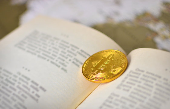 Bitcoin background. Bitcoin and the book as a concept of knowledge and wealth.
