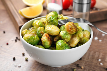 Bowl with roasted brussel sprouts on table