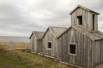 Fototapeta na wymiar Wood Islands Provencial Park wooden fishing huts on coast