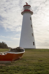 Point Prim Lighthouse, PEI and wooden boat