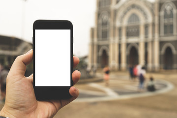 Hand on smartphone Blank Screen on Blur background