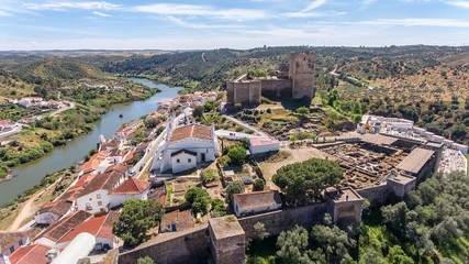 Fototapeta na wymiar Aerial. The village of M rtola filmed with drone sky. Portugal Alentejo Guadiana