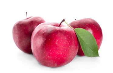 Red ripe apples on white background
