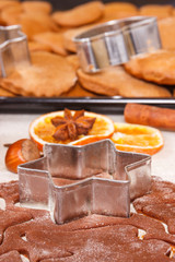 Dough and accessories for baking gingerbread and fresh baked cookies for Christmas time