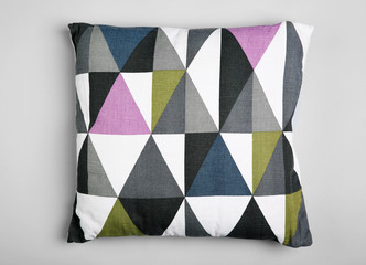 Soft pillow on light background