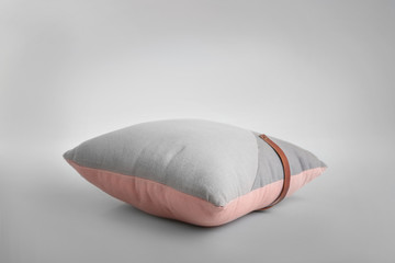 Soft pillow on light background