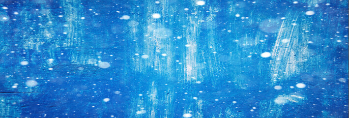 the paint is blue. white strokes. background and texture. New Year's design. snowy background