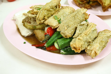 Yong Tau Foo, a Hakka Chinese cuisine consisting of tofu and vegetables stuffed with ground meat mixture or fish paste.