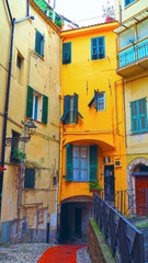 Narrow medieval, old street in San Remo, Liguria, Italy