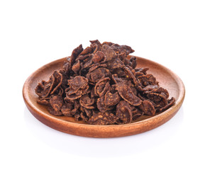Corn Flakes coated chocolate isolated In a wooden dish on white background.