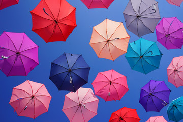 Colorful umbrellas and blue sky