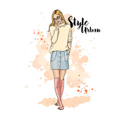 Urban style. Casual image. Hand drawn sketch. Young stylish woman in a skirt with decorative buttons and sweater oversize.  Vector illustration.