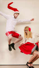 Obraz premium Happy active couple dancing and jumping.