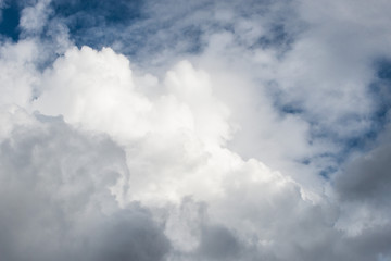 Beautiful purely white fluffy white cloud like cotton candy against the clear blue sky