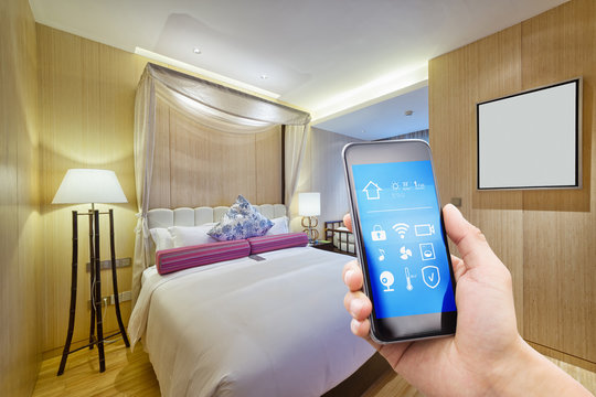 smart phone with smart home with modern bedroom