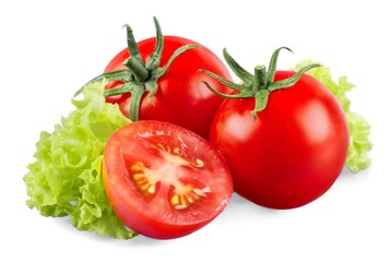Cherry tomatoes and basil leaves isolated on white