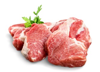 Pieces of crude meat with parsley