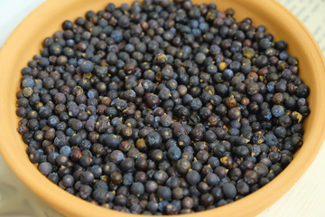 dried juniper berries in the bowl