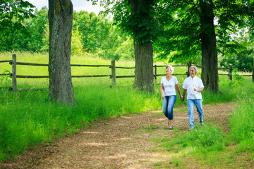 Obraz premium Senior Couple Taking A Walk