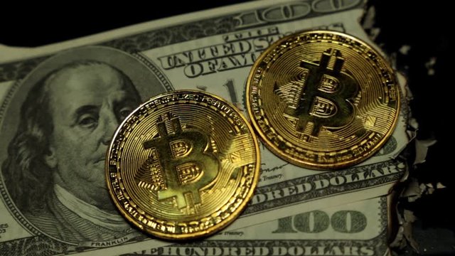 Burning, smoldering dollars and bitcoin.