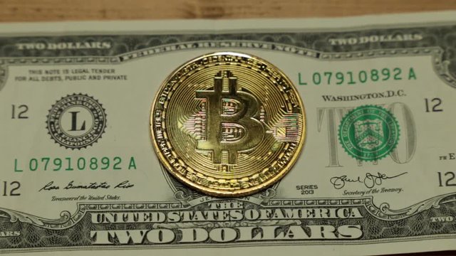 Bitcoins and dollar. US dollar and bitcoin coin.