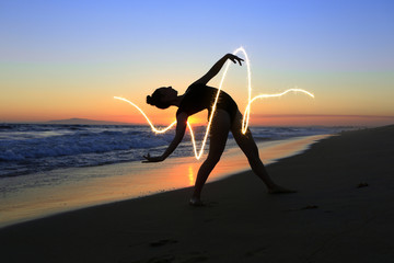 Skilled Young Dancer at the Beach During Sunset - Powered by Adobe