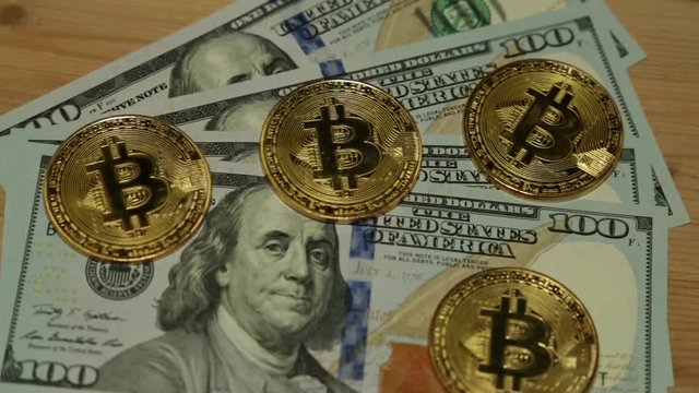 Bitcoins and dollar. US dollar and bitcoin coin.