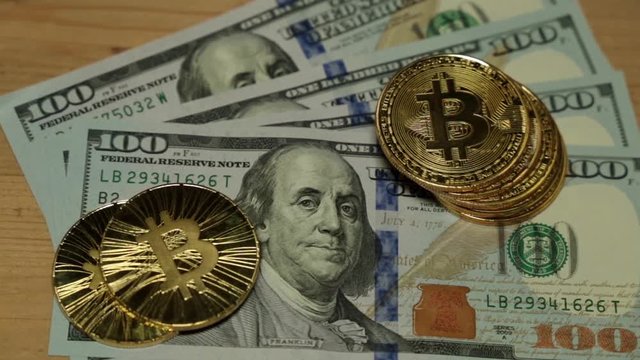 Bitcoins and dollar. US dollar and bitcoin coin.