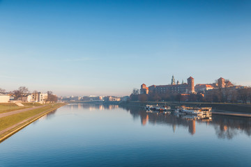Fototapeta premium Sunrise over the historic royal Wawel Castle in Cracow, Poland