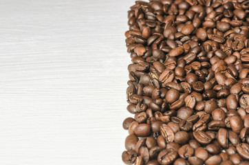 Frame of coffee beans with free space for text, white background top view