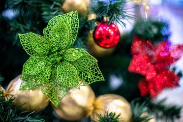 Christmas background-colored toys hang on the Christmas tree 