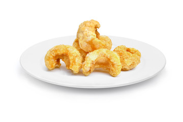 pork snack, pork rind, pork scratching, pork crackling,  Asian food in the white plate isolated on white background