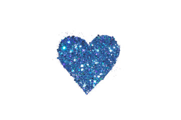 Abstract heart of blue glitter sparkles on white background.