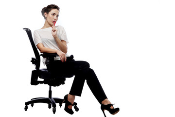 brunette in business style sitting on a chair