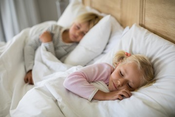 Girl sleeping in the bedroom