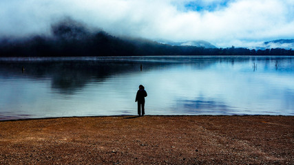 alone next to lake