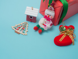 Christmas decoration  on colour background . Red and gift box and decoration object  .top  view composition.