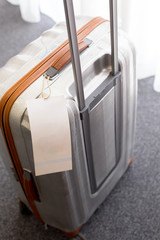 Close up of blank  luggage tag label on a suitcase
