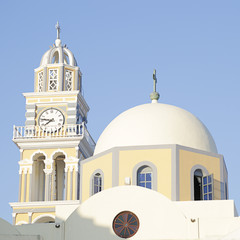 Fototapeta na wymiar Cathedral of Saint John the Baptist in Fira. It is the main Catholic church on Santorini Island, Greece